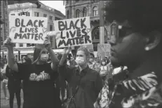  ?? ASSOCIATED PRESS ?? PEOPLE TAKE PART IN A BLACK LIVES MATTER PROTEST in Amsterdam, Netherland­s, Monday to protest against the recent killing of George Floyd, a black man who died in police custody in Minneapoli­s, Minn., after being restrained by police officers on Memorial Day.