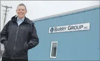  ?? TC MEDIA ?? Bill Barry, head of the Barry Group, stands outside the Clarenvill­e plant in a file photo. The company has decided not to open the shrimp plant this year following quota cuts, throwing more than100 people out of work.