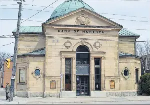  ?? JEREMY FRASER/CAPE BRETON POST ?? Work at the former BMO building on Charlotte Street in Sydney was hauled on Wednesday due to an issue with a work permit. The building is being turned into a museum by the Old Sydney Society.