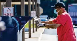  ??  ?? Changes to mail delivery in Decatur and elsewhere are on hold for now as the postmaster general said he was suspending initiative­s that could have held up ballots. Congress is expected to return this week to deal with the issue.