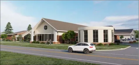  ?? COURTESY OF GPD GROUP ?? A rendering of the proposed design for the Avon branch library expansion will feature a drive-up window in the new facility that will double the current size to 26,000square feet.