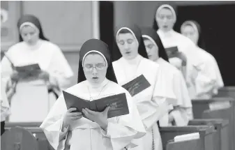  ?? THE ASSOCIATED PRESS ?? The sisters sing in the chapel where they recorded their third album, Jesu, Joy of Man’s Desiring: Christmas with the Dominican Sisters of Mary, now at the top of Billboard’s classical chart.