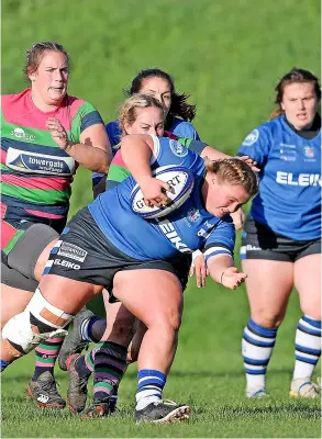  ?? ?? Bath Rugby Ladies’ Megan Wynne carries the ball during the victory over Reading