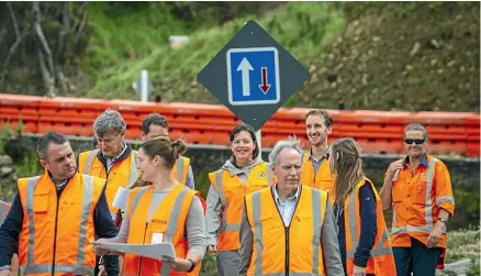  ?? BRADEN FASTIER/STUFF ?? Associate Minister of Transport Julie Anne Genter, centre, visits repair sites on the Takaka Hill section of State Highway 60, which was badly damaged when ex-tropical cyclone Gita hit the region.