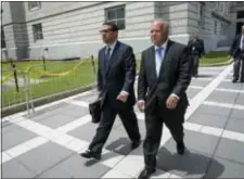  ?? CRAIG RUTTLE — THE ASSOCIATED PRESS ?? David Wildstein, left, walks with his attorney Alan Zegas from a federal court in Newark, N.J., Wednesday after he was sentenced. Wildstein, a former ally to New Jersey Gov. Chris Christie who was the mastermind of the 2013 George Washington Bridge...