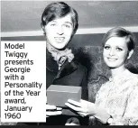  ??  ?? Model Twiggy presents Georgie with a Personalit­y of the Year award, January 1960