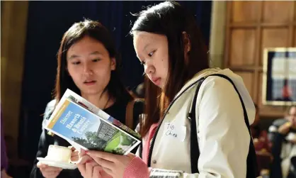  ?? Photograph: Paula Solloway/Alamy ?? Internatio­nal students from Bradford University visit the town hall.