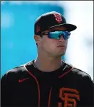  ?? RANDY VAZQUEZ/TRIBUNE NEWS SERVICE ?? The Giants' Hunter Bishop before his team's Cactus League game at Camelback Ranch in Phoenix on Feb. 25. Bishop has tested positive for COVID-19.