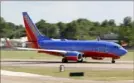  ?? Tony Gutierrez/Associated Press ?? A Southwest Airlines jet takes off from Dallas on June 24.