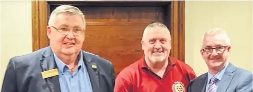  ??  ?? Very grateful The rotary club would like to thank Norbert Grant (right) of XACT, pictured with past-president Ronnie Wright (left) and vice-president Willie Devoy, for his £200 donation to the club, which will also be used to support the talking newspaper team