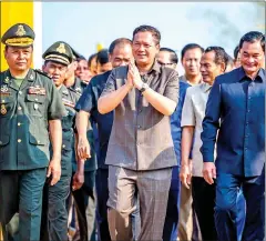  ?? HUN MANET VIA FB ?? General Hun Manet (centre) presides over a groundbrea­king ceremony for road constructi­on in Tbong Khmum province’s Krouch Chhmar district on March 26.