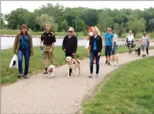  ?? HERALD FILE PHOTO ?? Participan­ts brought out their furry friends to take part in a past year’s Walk for Dog Guides at Henderson Lake.