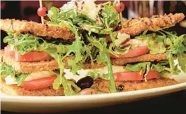  ?? MIA ROSEBUD ?? The Eggplant Stack, featuring breaded eggplant, beefsteak tomatoes, fresh mozzarella, arugula and kalamata olives, is on the menu at the new Mia Rosebud, which opened on Feb. 19 in Boca Raton.