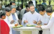  ?? PTI ?? Rahul Gandhi shares a meal with Karnataka CM Siddaramai­ah and other senior party leaders in Bengaluru on Wednesday.