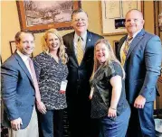  ??  ?? Advocates from the Down Syndrome Associatio­n of Central Oklahoma met with legislator­s for the annual Buddy Walk on Washington in April. From left, organizati­on members Josh Harlow and Fara Taylor met with U.S. Rep. Tom Cole, R-Moore, along with fellow...