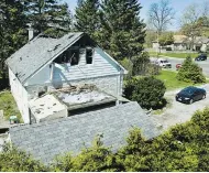  ?? ERNEST DOROSZUK / POSTMEDIA NEWS FILES ?? The aftermath of a fire in Whitby, Ont., that left threeteena­gers dead in the early hours of April 29, 2012.