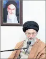  ?? OFFICE OF THE IRANIAN SUPREME LEADER VIA AP ?? In this Tuesday photo released by official website of the office of the Iranian supreme leader, Supreme Leader Ayatollah Ali Khamenei speaks in a meeting as he sits under a portrait of the late Iranian revolution­ary founder Ayatollah Khomeini, in...