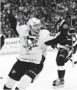  ??  ?? The Penguins’ Sidney Crosby celebrates his second-period goal against the Lightning.