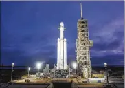  ?? SPACEX ?? A Falcon Heavy rocket is expected to launch this week from Cape Canaveral, Fla. The Heavy will be capable of lifting super-size satellites into orbit and sending spacecraft to the moon, Mars and beyond.