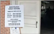  ?? Olivia Morley ?? A sign posted outside the Garden Lakes Baptist Church early voting location asks voters to wear masks. While the Board of Elections encourages voters to wear masks, elections chief Robert Brady said they can’t enforce a mask mandate at precincts.