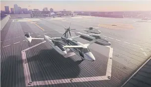  ?? UBER ?? Vertical takeoff and landing craft, like this Uber model, could be shuttling passengers around cities by the mid-2020s, according to reports and companies working in the space.