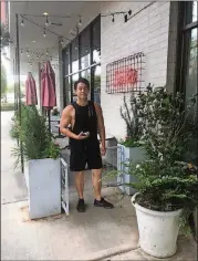  ?? LIGAYA FIGUERAS / LFIGUERAS@AJC.COM ?? Guy Wong exercises regularly at a gym down the street from Le Fat, his restaurant in West Midtown. He’s lost 40 pounds.