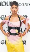  ?? ASTRID STAWIARZ GETTY IMAGES ?? Halsey knows the support garment is not glamorous but she threw her back out trying to carry a tune.
