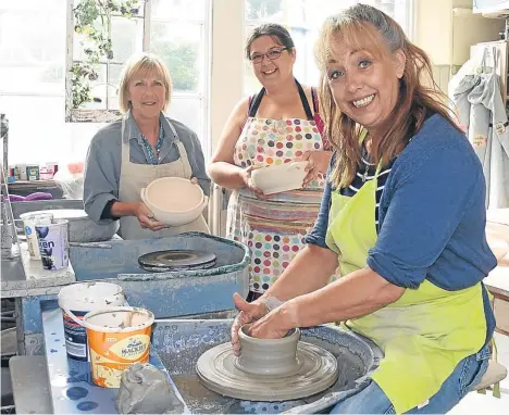  ??  ?? A COMMUNITY arts collective from Forgan Arts Centre made 25 handcrafte­d pots to be smashed on stage during a dinner scene in Dundee Rep’s latest production, August: Osage County.
The arts centre, a community organisati­on that offers educationa­l and...