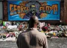  ?? Photograph: Carlos Barría/Reuters ?? A local resident stands in front of a makeshift memorial honoring George Floyd in Minneapoli­s, Minnesota.