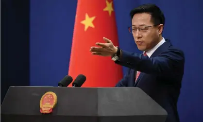  ?? Photograph: Greg Baker/AFP/Getty Images ?? Zhao Lijian, a Chinese foreign ministry spokesman, said the launch was ‘a routine spacecraft test’.