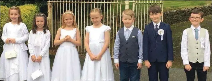  ??  ?? Pupils from Kilmacanog­ue NS who received their First Holy Communion at St Mary’s church in Enniskerry.