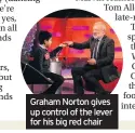  ??  ?? Graham Norton gives up control of the lever for his big red chair