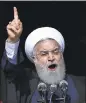  ?? EBRAHIM NOROOZI — AP ?? Iranian President Hassan Rouhani delivers a speech during a rally Sunday in Tehran marking the 39th anniversar­y of the 1979 Islamic Revolution in Iran.