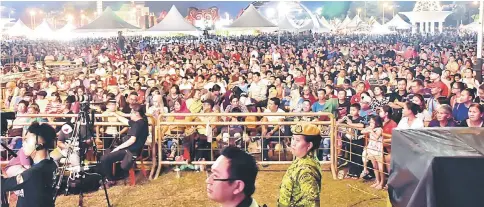  ??  ?? A section of the huge crowd from all walks of life watching the closing of BCF 2017.