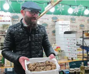  ?? Liza Weisstuch/TNS ?? On Verona’s famous Piazza delle Erbe, you can find anything, even prized white truffles.