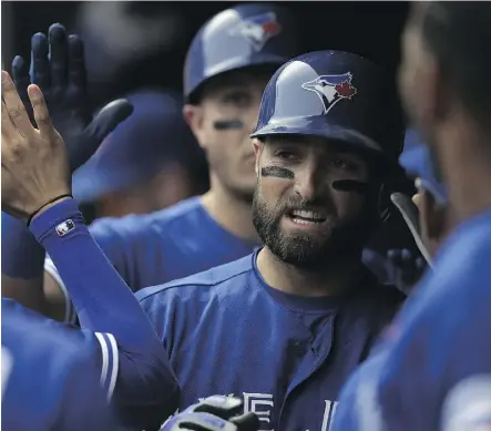  ?? GETTY IMAGES ?? Kevin Pillar of the Toronto Blue Jays says it was all about having the back of his teammate when he went after the Texas Rangers’ Rougned Odor after he slugged Jose Bautista during a dust-up Sunday.