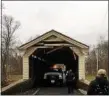  ?? PHOTO FROM EAST PIKELAND TOWNSHIP POLICE ?? The historic Rapps Dam Road Bridge which carries traffic over French Creek in East Pikeland Township was struck by a vehicle Thursday, March 29, leaving it damaged.
