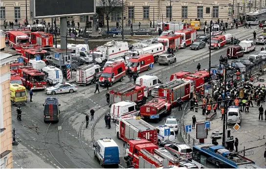  ?? PHOTO: REUTERS ?? Emergency services vehicles jam a road intersecti­on outside the Sennaya Ploshchad metro station, following explosions in two train carriages in St. Petersburg.