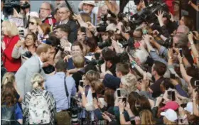  ?? FRANK AUGSTEIN - THE ASSOCIATED PRESS ?? Britain’s Prince Harry greets crowds in Windsor, near London, England, Friday, May 18, 2018. Preparatio­ns continue in Windsor ahead of the royal wedding of Britain’s Prince Harry and Meghan Markle on Saturday May 19.