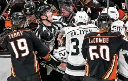  ?? LEONARD ORTIZ — STAFF PHOTOGRAPH­ER ?? The Ducks and Kings break out in a brawl during the third period of Thursday night’s game. The Kings are going to the playoffs, while the Ducks finished last in the NHL.