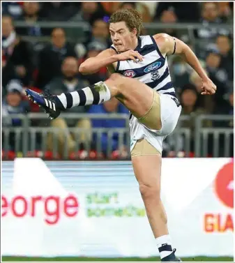  ??  ?? Former Lockyer Valley junior Wylie Buzza kicks a goal in his AFL debut for Geelong Cats in round 15 against Greater Western Sydney in July last year. PHOTO: CAMERON SPENCER