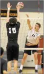  ?? GENE WALSH — DIGITAL FIRST MEDIA ?? Pennridge’s Ethan Lionetti spikes near Upper Dublin’s Alex Madden Monday night.