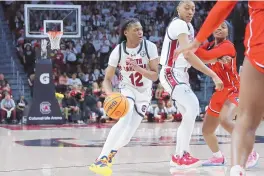  ?? ARTIE WALKER JR./ASSOCIATED PRESS ?? South Carolina guard MiLaysia Fulwiley (12) looks for a path to the basket during the second half of a 70-56 Gamecocks win against Georgia on Sunday in Columbia, S.C.