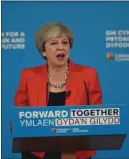  ?? AFP /LEhtikUVA/PAUL ELLiS
Foto: ?? retirerar. Theresa May tvingades backa om ett hårt kritiserat förslag när hon talade i Wales.