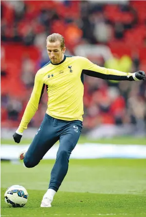  ?? — AFP photo ?? Tottenham Hotspur’s English striker Harry Kane warms up ahead of the English Premier League football match between Manchester United and Tottenham Hotspur at Old Trafford in Manchester, north west England, on March 15, 2015.