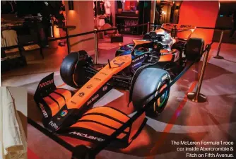  ?? ?? The McLaren Formula 1 race car inside Abercrombi­e & Fitch on Fifth Avenue.