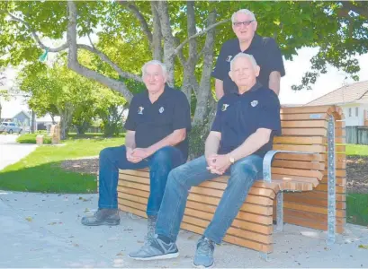  ??  ?? Katikati Lions Club foundation members, from left, Garry Taylor, brother Kevin Taylor (back), and David Eddy in the revamped park on the corner of Beach and Park Roads — initially developed by the Lions.