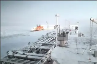  ?? Picture: Teekay ?? BREAKING THROUGH: Aboard the LNG carrier Eduard Toll on passage to Sabetta to load her next cargo of LNG. Off the port side is a Russian icebreaker.