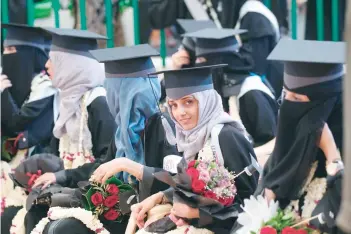  ?? AFP ?? Female Yemeni university students attend a graduation ceremony in the capital Sanaa. —