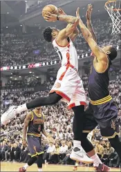  ?? FRANK GUNN / AP ?? Raptors guard DeMar DeRozan shoots over Cavaliers forward Channing Frye during Game 3. DeRozan’s 37 points couldn’t prevent a Toronto defeat.